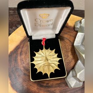 GOLD SUN FACE PENDANT BY LS